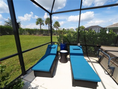 This spacious two story home all-concrete block construction has on Esplanade Golf and Country at Lakewood Ranch in Florida - for sale on GolfHomes.com, golf home, golf lot