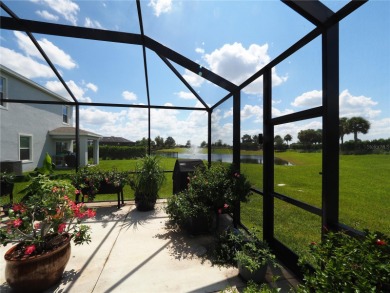 This spacious two story home all-concrete block construction has on Esplanade Golf and Country at Lakewood Ranch in Florida - for sale on GolfHomes.com, golf home, golf lot