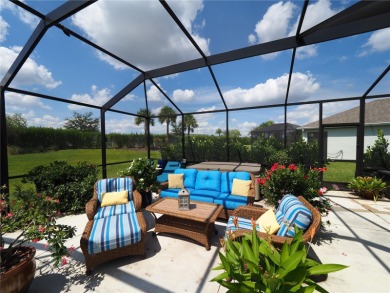This spacious two story home all-concrete block construction has on Esplanade Golf and Country at Lakewood Ranch in Florida - for sale on GolfHomes.com, golf home, golf lot