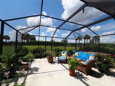 This spacious two story home all-concrete block construction has on Esplanade Golf and Country at Lakewood Ranch in Florida - for sale on GolfHomes.com, golf home, golf lot