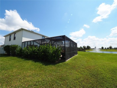 This spacious two story home all-concrete block construction has on Esplanade Golf and Country at Lakewood Ranch in Florida - for sale on GolfHomes.com, golf home, golf lot