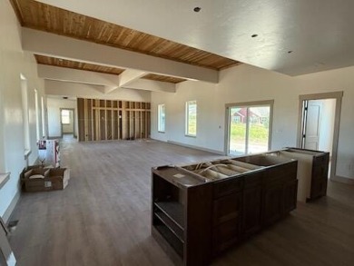 This beautiful new home in the Powder Horn Golf Community offers on The Powder Horn Golf Club - Mountain in Wyoming - for sale on GolfHomes.com, golf home, golf lot