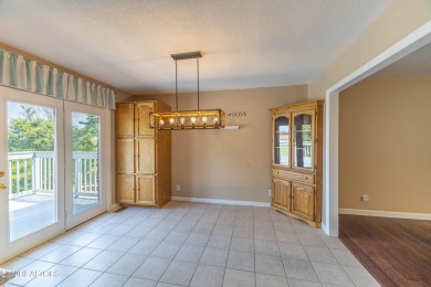 This well-kept split foyer home offers plenty of space and on Executive Meadows in Tennessee - for sale on GolfHomes.com, golf home, golf lot