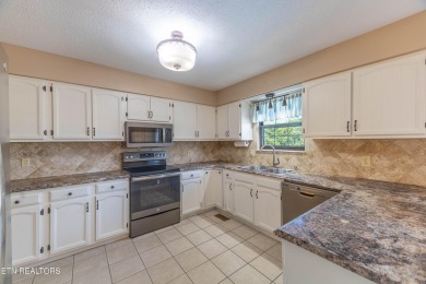 This well-kept split foyer home offers plenty of space and on Executive Meadows in Tennessee - for sale on GolfHomes.com, golf home, golf lot