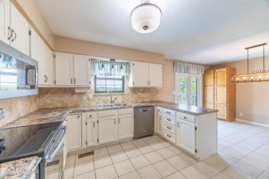 This well-kept split foyer home offers plenty of space and on Executive Meadows in Tennessee - for sale on GolfHomes.com, golf home, golf lot