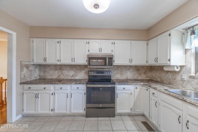 This well-kept split foyer home offers plenty of space and on Executive Meadows in Tennessee - for sale on GolfHomes.com, golf home, golf lot