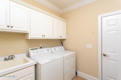 A lightly used second home overlooking the eighteenth green of on Beacon Ridge Golf and Country Club in North Carolina - for sale on GolfHomes.com, golf home, golf lot