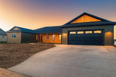 This beautiful new home in the Powder Horn Golf Community offers on The Powder Horn Golf Club - Mountain in Wyoming - for sale on GolfHomes.com, golf home, golf lot
