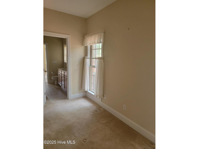 A lightly used second home overlooking the eighteenth green of on Beacon Ridge Golf and Country Club in North Carolina - for sale on GolfHomes.com, golf home, golf lot