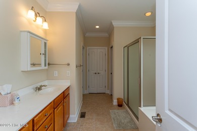 A lightly used second home overlooking the eighteenth green of on Beacon Ridge Golf and Country Club in North Carolina - for sale on GolfHomes.com, golf home, golf lot