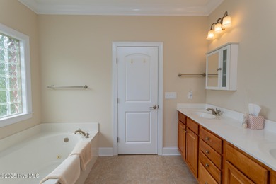 A lightly used second home overlooking the eighteenth green of on Beacon Ridge Golf and Country Club in North Carolina - for sale on GolfHomes.com, golf home, golf lot