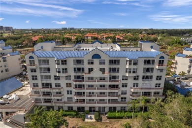 Welcome to Crystal Bay, an elegant oasis nestled within the on Feather Sound Country Club in Florida - for sale on GolfHomes.com, golf home, golf lot
