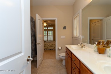 A lightly used second home overlooking the eighteenth green of on Beacon Ridge Golf and Country Club in North Carolina - for sale on GolfHomes.com, golf home, golf lot