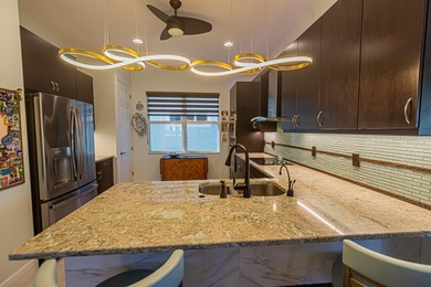 PGA Verano! Boasting $95k+ in upgrades, this Arezzo home sits on on PGA Golf Club in PGA Village in Florida - for sale on GolfHomes.com, golf home, golf lot