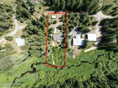100 feet of Lamb Creek frontage in a peaceful, private setting on Priest Lake Golf and Tennis Club in Idaho - for sale on GolfHomes.com, golf home, golf lot