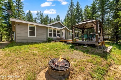 100 feet of Lamb Creek frontage in a peaceful, private setting on Priest Lake Golf and Tennis Club in Idaho - for sale on GolfHomes.com, golf home, golf lot