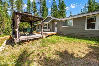 100 feet of Lamb Creek frontage in a peaceful, private setting on Priest Lake Golf and Tennis Club in Idaho - for sale on GolfHomes.com, golf home, golf lot