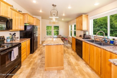 100 feet of Lamb Creek frontage in a peaceful, private setting on Priest Lake Golf and Tennis Club in Idaho - for sale on GolfHomes.com, golf home, golf lot