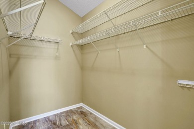 This is an estate sale, sold AS IS. Some cosmetic updates and on Jacksonville Golf and Country Club in Florida - for sale on GolfHomes.com, golf home, golf lot