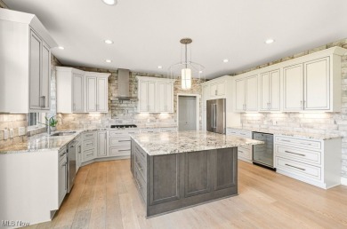 Welcome home to this beautifully updated brick colonial located on Gleneagles Golf Club in Ohio - for sale on GolfHomes.com, golf home, golf lot