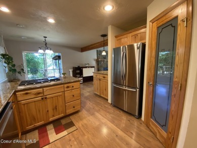 Nestled in a park-like setting just minutes from Pinehurst Golf on Pinehurst Golf Course in Idaho - for sale on GolfHomes.com, golf home, golf lot