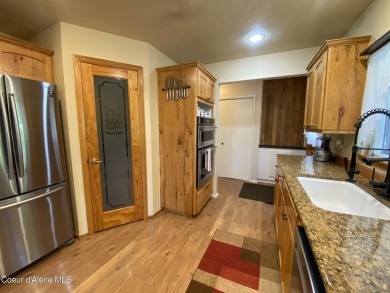 Nestled in a park-like setting just minutes from Pinehurst Golf on Pinehurst Golf Course in Idaho - for sale on GolfHomes.com, golf home, golf lot