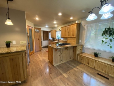 Nestled in a park-like setting just minutes from Pinehurst Golf on Pinehurst Golf Course in Idaho - for sale on GolfHomes.com, golf home, golf lot