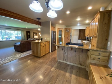 Nestled in a park-like setting just minutes from Pinehurst Golf on Pinehurst Golf Course in Idaho - for sale on GolfHomes.com, golf home, golf lot