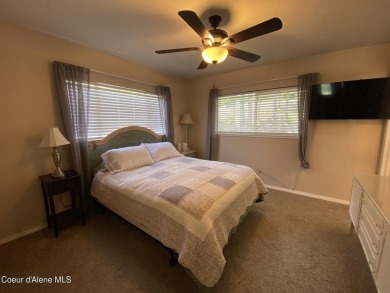 Nestled in a park-like setting just minutes from Pinehurst Golf on Pinehurst Golf Course in Idaho - for sale on GolfHomes.com, golf home, golf lot