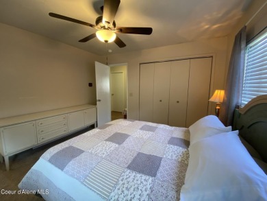Nestled in a park-like setting just minutes from Pinehurst Golf on Pinehurst Golf Course in Idaho - for sale on GolfHomes.com, golf home, golf lot