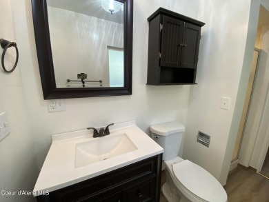 Nestled in a park-like setting just minutes from Pinehurst Golf on Pinehurst Golf Course in Idaho - for sale on GolfHomes.com, golf home, golf lot
