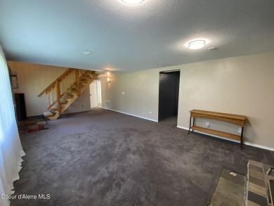Nestled in a park-like setting just minutes from Pinehurst Golf on Pinehurst Golf Course in Idaho - for sale on GolfHomes.com, golf home, golf lot