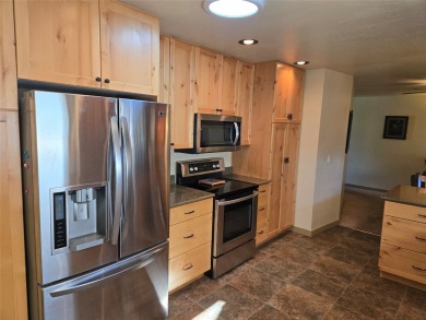 Charming one level ranch home conveniently located by the on Buffalo Hill Golf Club in Montana - for sale on GolfHomes.com, golf home, golf lot
