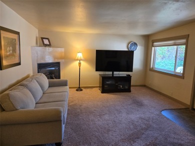 Charming one level ranch home conveniently located by the on Buffalo Hill Golf Club in Montana - for sale on GolfHomes.com, golf home, golf lot
