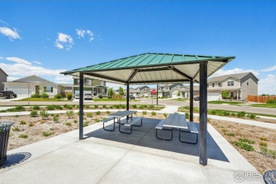This delightful home backs to open space and offers picturesque on Coyote Creek Golf Course in Colorado - for sale on GolfHomes.com, golf home, golf lot