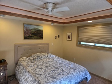 Charming one level ranch home conveniently located by the on Buffalo Hill Golf Club in Montana - for sale on GolfHomes.com, golf home, golf lot