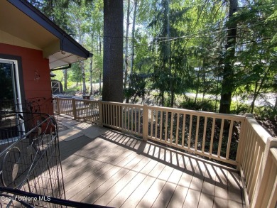 Nestled in a park-like setting just minutes from Pinehurst Golf on Pinehurst Golf Course in Idaho - for sale on GolfHomes.com, golf home, golf lot