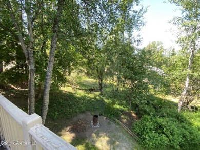Nestled in a park-like setting just minutes from Pinehurst Golf on Pinehurst Golf Course in Idaho - for sale on GolfHomes.com, golf home, golf lot