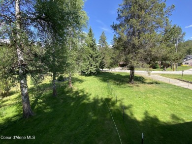 Nestled in a park-like setting just minutes from Pinehurst Golf on Pinehurst Golf Course in Idaho - for sale on GolfHomes.com, golf home, golf lot