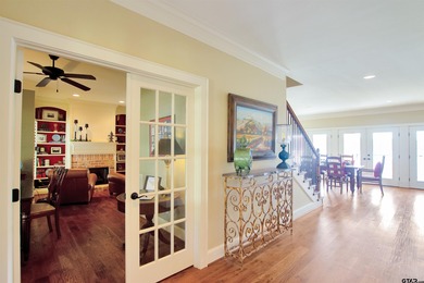 This stunning 4-bedroom, custom built 3408 sq ft lake front home on Hide-A-Way Lake Golf Course in Texas - for sale on GolfHomes.com, golf home, golf lot