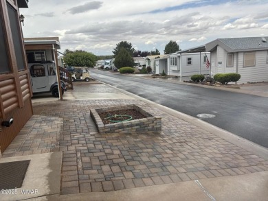Welcome home to this great park model in desirable Juniper Ridge on Juniper Ridge R.V. Golf Resort in Arizona - for sale on GolfHomes.com, golf home, golf lot