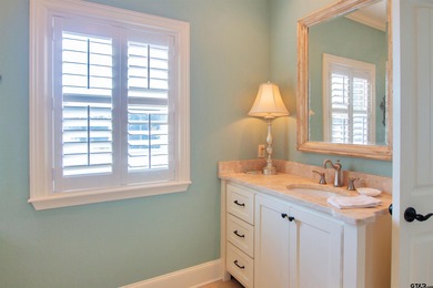 This stunning 4-bedroom, custom built 3408 sq ft lake front home on Hide-A-Way Lake Golf Course in Texas - for sale on GolfHomes.com, golf home, golf lot