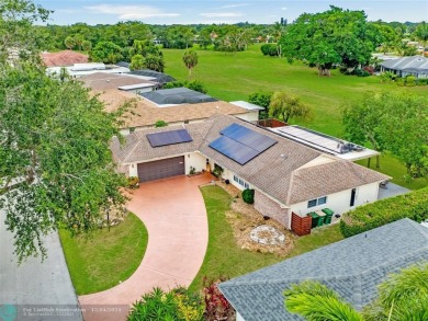 GOLF COURSE VIEW TO BECOME A LAKE VIEW.  A COMPLETELY RENOVATED on Woodlands Country Club in Florida - for sale on GolfHomes.com, golf home, golf lot