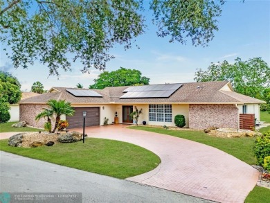 GOLF COURSE VIEW TO BECOME A LAKE VIEW.  A COMPLETELY RENOVATED on Woodlands Country Club in Florida - for sale on GolfHomes.com, golf home, golf lot