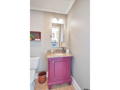 This stunning 4-bedroom, custom built 3408 sq ft lake front home on Hide-A-Way Lake Golf Course in Texas - for sale on GolfHomes.com, golf home, golf lot