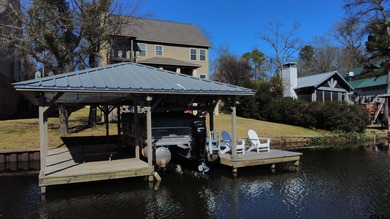 This stunning 4-bedroom, custom built 3408 sq ft lake front home on Hide-A-Way Lake Golf Course in Texas - for sale on GolfHomes.com, golf home, golf lot
