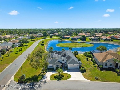 Beautifully updated 1994 Palmwood Bahama Breeze courtyard pool on Glen Lakes Country Club in Florida - for sale on GolfHomes.com, golf home, golf lot