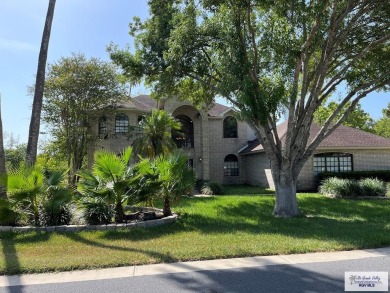 THIS MAJESTIC HOME, IN PRESTIGIOUS RANCHO VIEJO HAS A BEAUTIFUL on Rancho Viejo Resort and Country Club in Texas - for sale on GolfHomes.com, golf home, golf lot