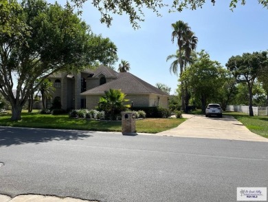 THIS MAJESTIC HOME, IN PRESTIGIOUS RANCHO VIEJO HAS A BEAUTIFUL on Rancho Viejo Resort and Country Club in Texas - for sale on GolfHomes.com, golf home, golf lot