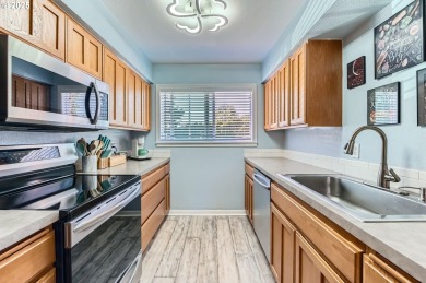 Enjoy low-maintenance living with golf course views in this on Gresham Golf Course in Oregon - for sale on GolfHomes.com, golf home, golf lot